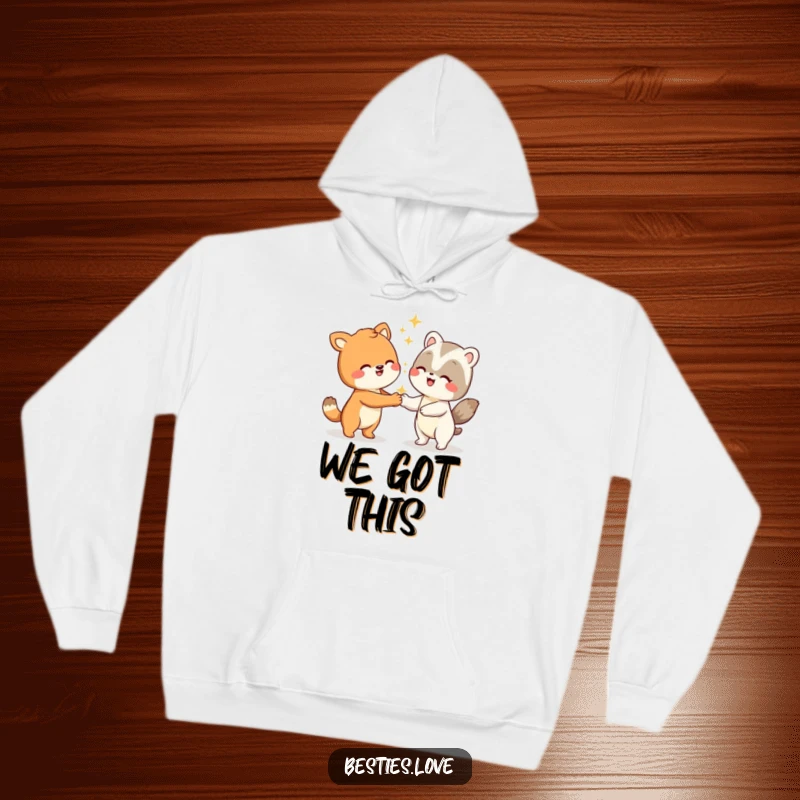 Funny animal hoodie depicting two gleeful characters executing a whimsical handshake with dazzling sparkles, symbolizing pure camaraderie.