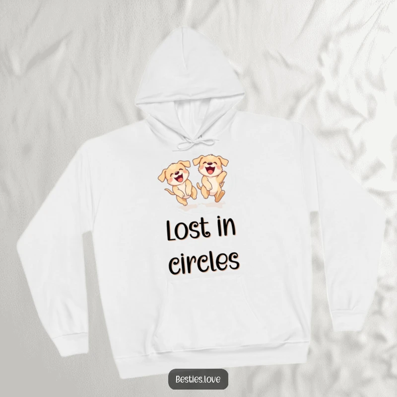Funny hoodie depicting two laughing puppies chasing their tails in a dizzying circle, embodying playful energy and canine silliness.