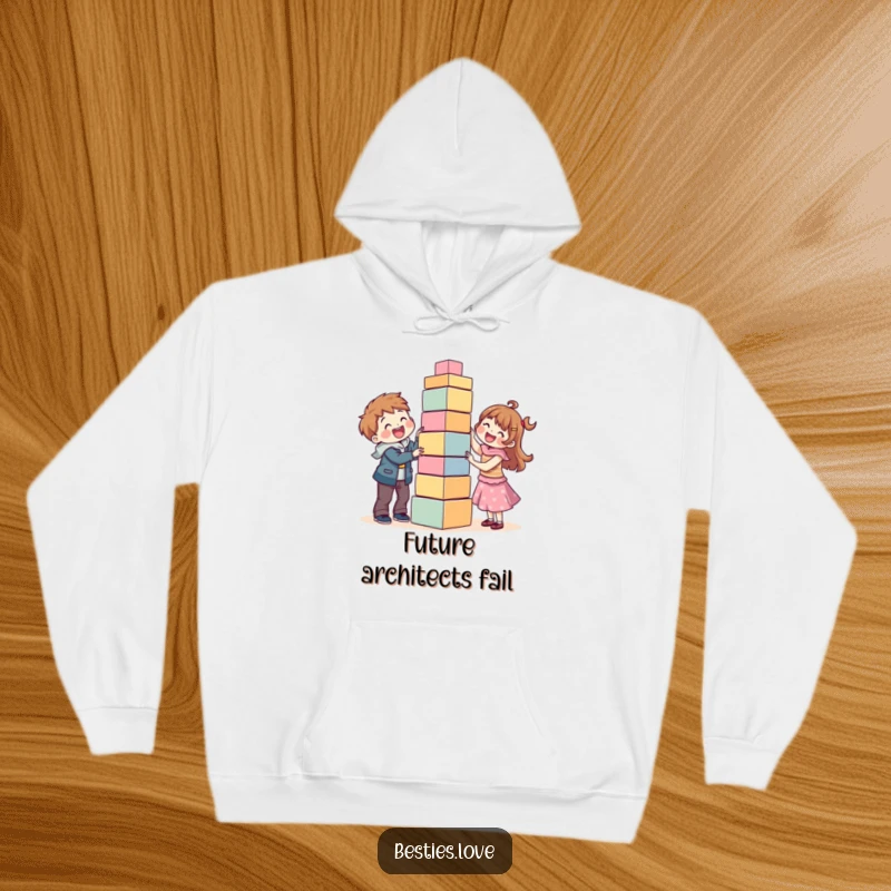 Funny and warm hoodie of best friends joyfully building a precarious, tall block tower, capturing a moment of collaborative fun and laughter.