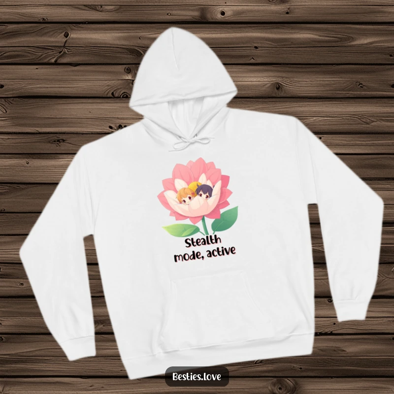 Funny, cozy hoodie with two characters playfully peeking from behind a giant, vibrant flower, offering warmth and whimsy.