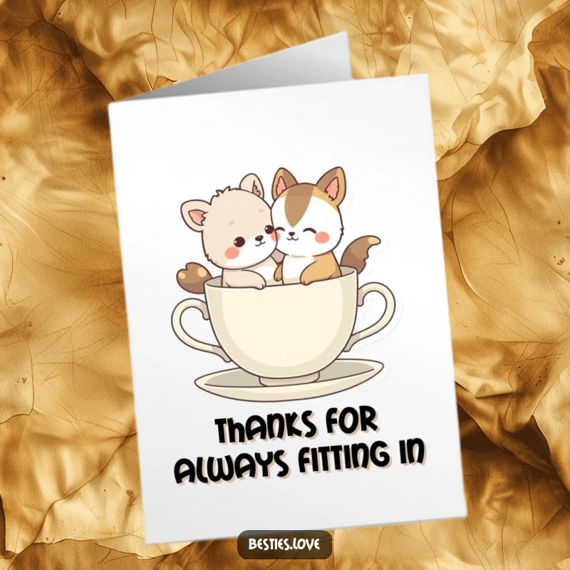 Funny Free Printable Thank You Card: Two bestie animals comically trying to fit into a tiny teacup, smiling with pure delight. A charming illustration.